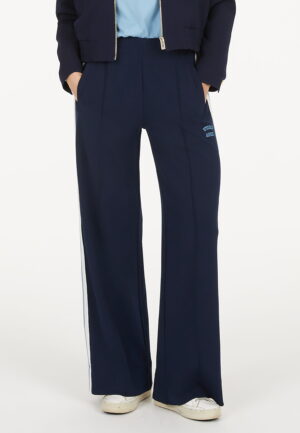 Tumši zilas bikses ar kontrastējošām sānu svītrām