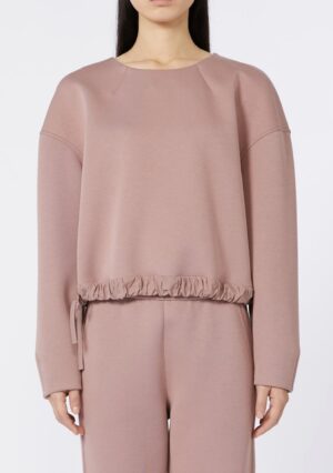 Pelēkrozā džemperis ar dekoratīvu apakšmalu