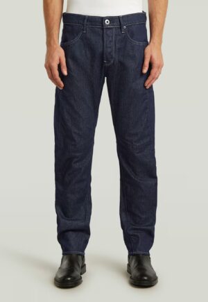 Džinsi ar kontrastējošām nošuvēm un pogu aizdari