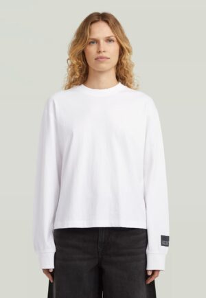 Organiskās kokvilnas T-krekls ar uzrakstu mugurpusē