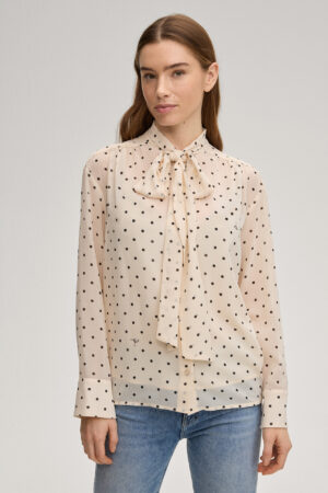 Blūze ar punktu rakstu un sasienamu apkakli