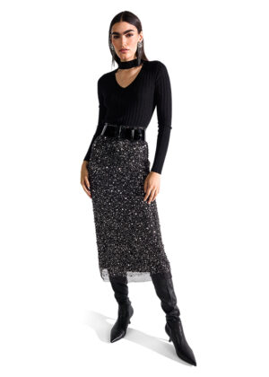 Mirdzoši svārki ar pērļu un fliteru izšuvumu