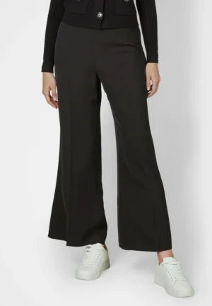 Saīsinātas paplatināta piegriezuma bikses sievietēm