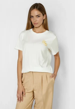 T-krekls ar pērlīšu izšuvumu uz uzrakstu mugurpusē