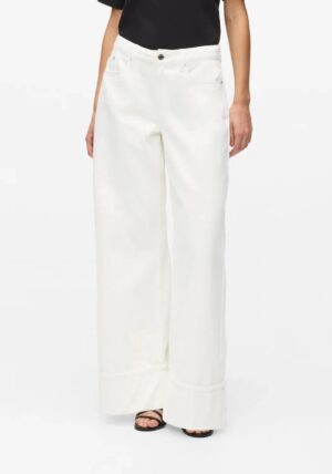 Plata piegriezuma džinsi ar fiksētiem atlokiem