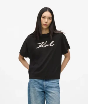 Melns T-krekls ar auklas veida logotipu